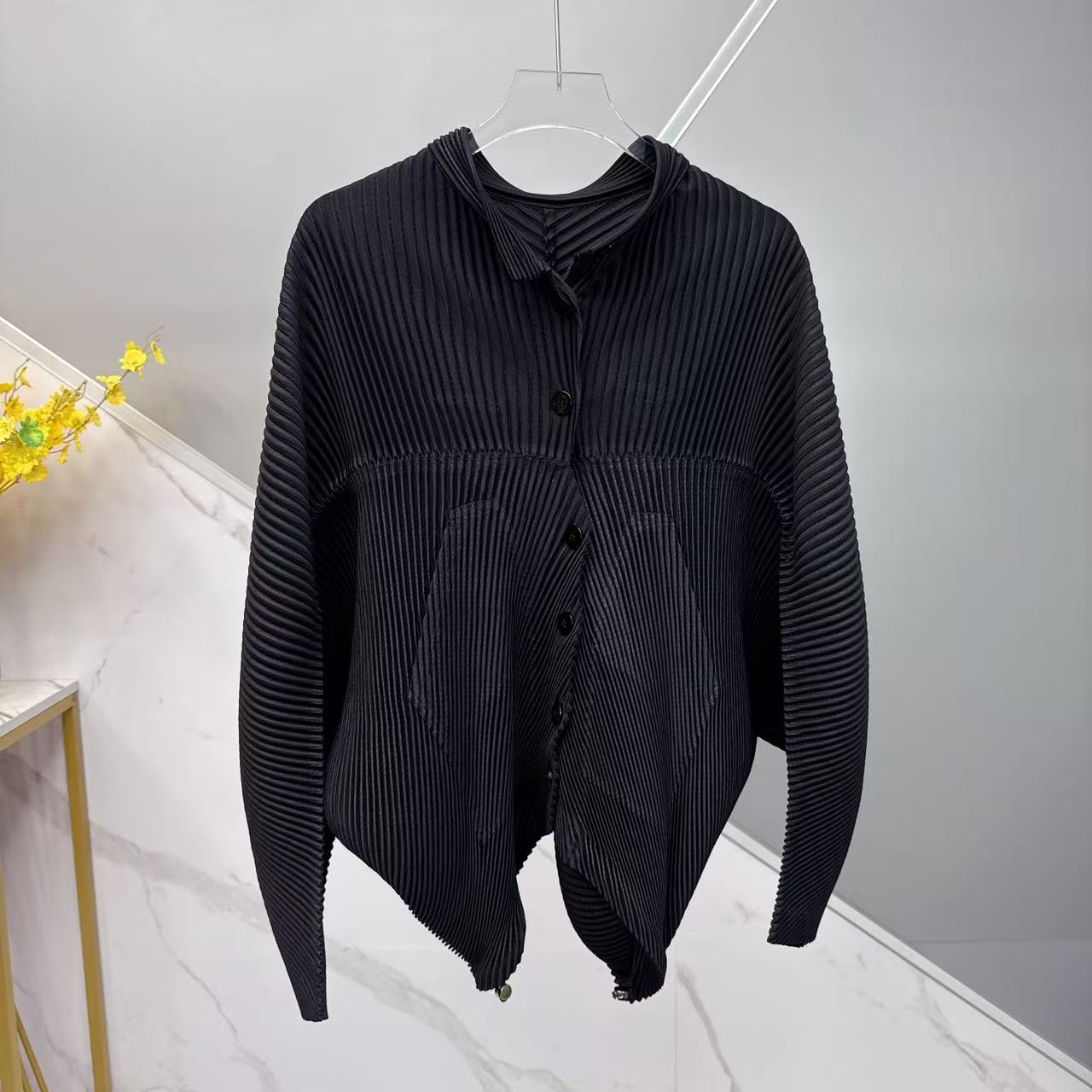 A Lady's Elegant Solid-colored Cardigan