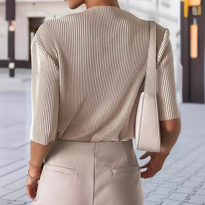 Top de punto ajustado de manga corta con mangas abullonadas y rayas verticales