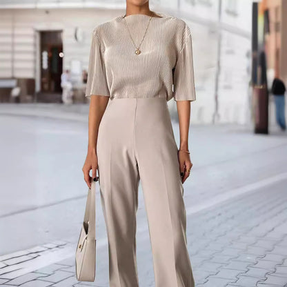 Top de punto ajustado de manga corta con mangas abullonadas y rayas verticales